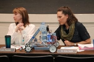 Laura Banister and Dr. Kilee Smith get 'schooled' on robotics.